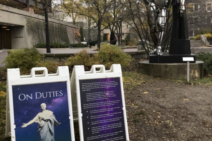 The statue of Hercules outside Statler Hall