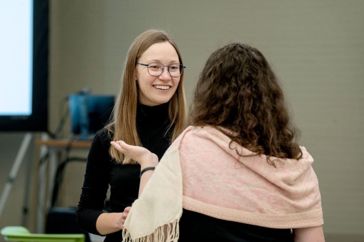 two women engaged in conversation